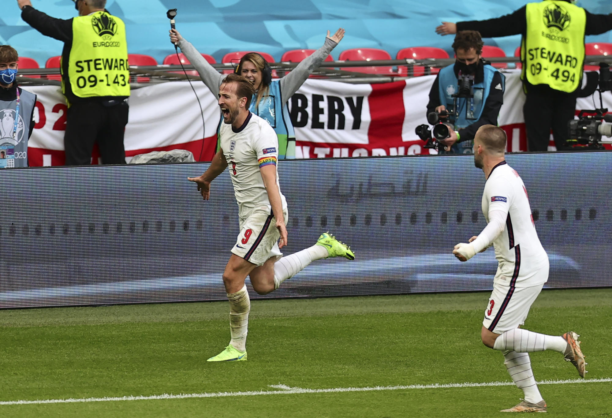 Harry Kane celebrates after scoring a goal.