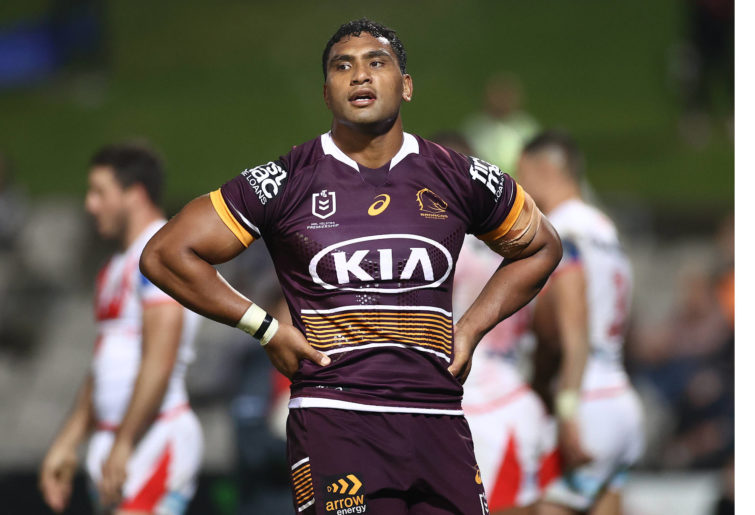 Tevita Pangai-Junior of the Broncos is dejected after a try by Ben Hunt of the Dragons.