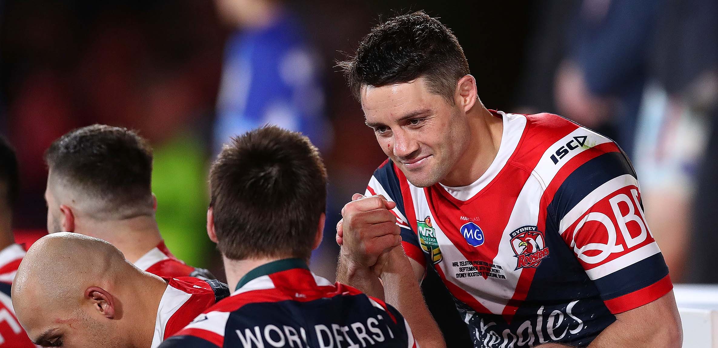 Cooper Cronk of the Roosters celebrates with Luke Keary