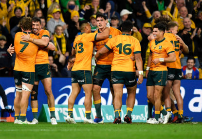 The Wallabies celebrate victory.