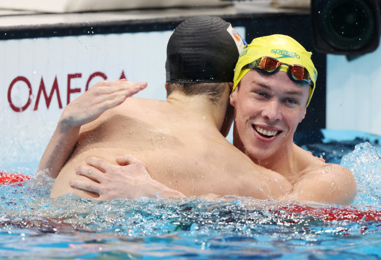 Zac Stubblety-Cook is congratulated by Dutch swimmer Arno Kamminga after winning gold.