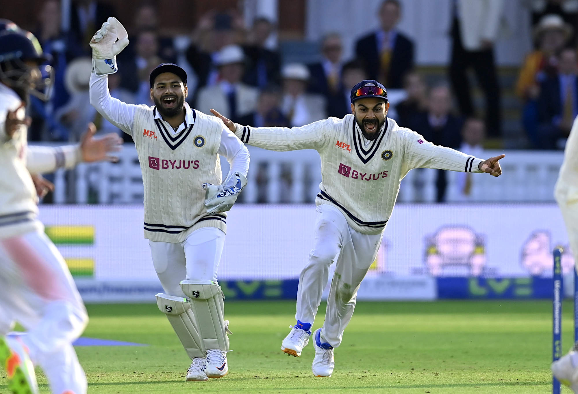 Rishabh Pant and Virat Kohli of India celebrate the final wicket and winning the Second LV= Insurance Test Match