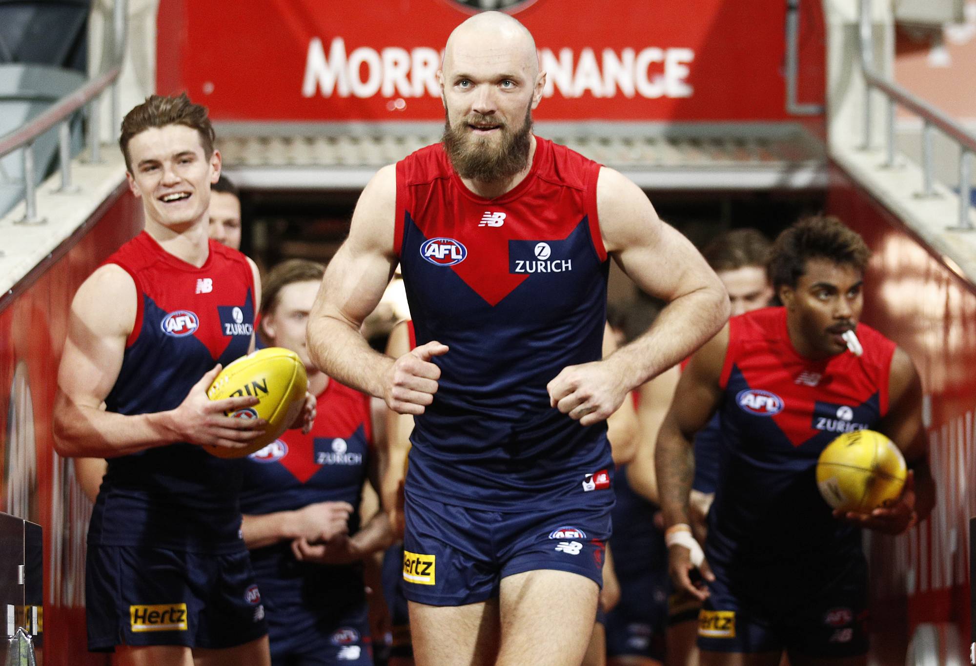 Max Gawn leads the Melbourne Demons out