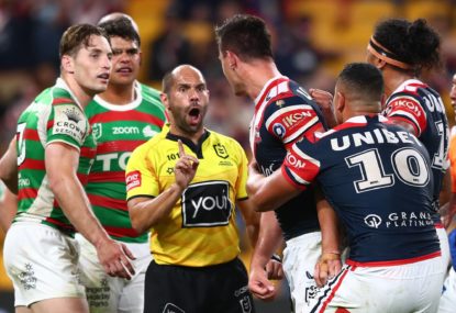 Referee Ashley Klein speaks with Joseph Manu of the Roosters after receiving a high tackle from Latrell Mitchell of the Rabbitohs