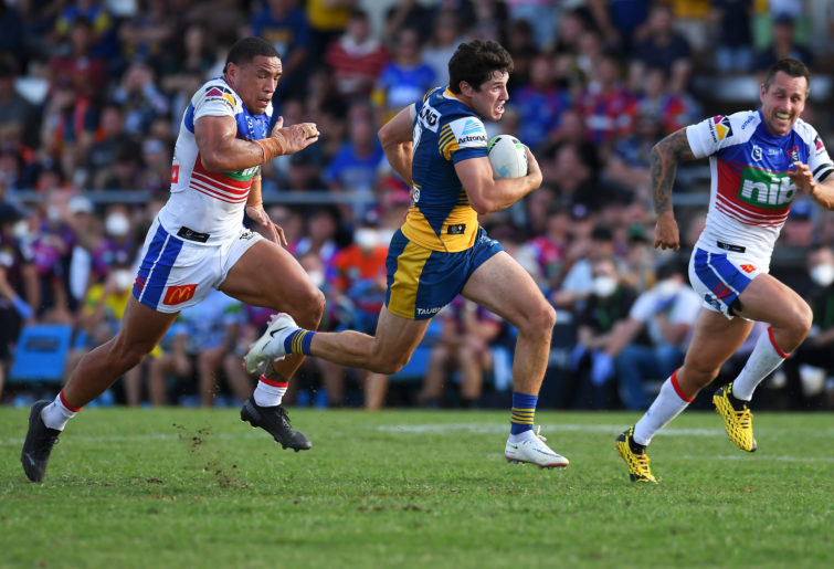 Mitchell Moses breaks away.