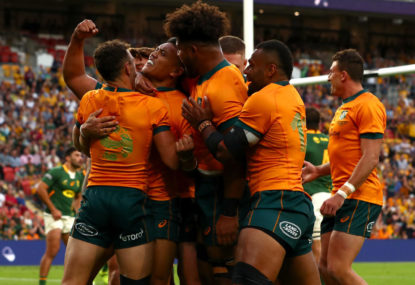 Len Ikitau of the Wallabies celebrates after scoring a try