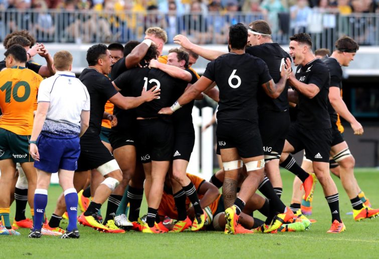 All Blacks celebrate after a try in the third Bledisloe Cup match