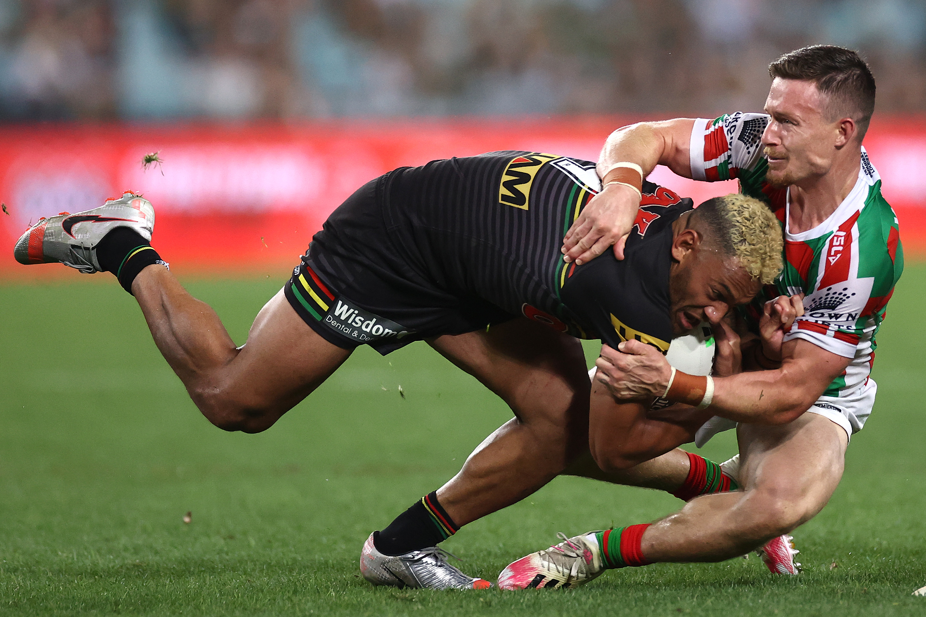 SYDNEY, AUSTRALIA - OCTOBER 17:  Apisai Koroisau of the Panthers is tackled by Damien Cook of the Rabbitohs during the NRL Preliminary Final match between the Penrith Panthers and the South Sydney Rabbitohs at ANZ Stadium on October 17, 2020 in Sydney, Australia. (Photo by Cameron Spencer/Getty Images)