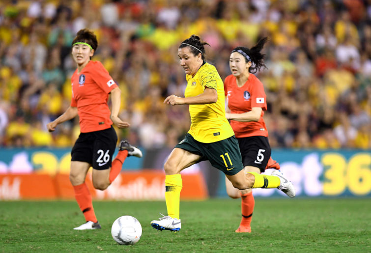 Lisa De Vanna of Australia breaks away from the defence
