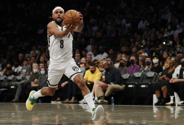 Patty Mills #8 of the Brooklyn Nets drives to the basket