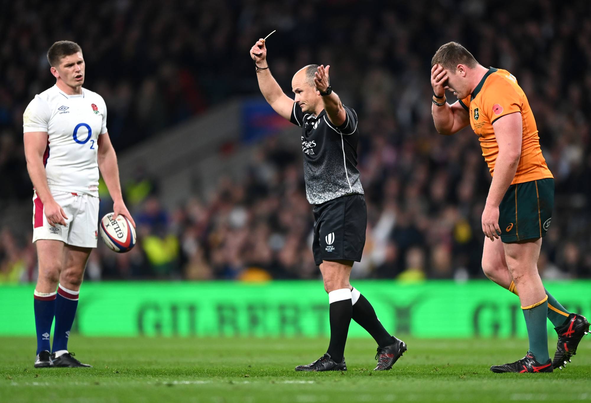 Angus Bell of Australia reacts as he receives a yellow card from referee Jaco Peyper during the Autumn Nations Series match between England and Australia at Twickenham Stadium on November 13, 2021 in London, in England.  (Photo by Shaun Botterill/Getty Images)