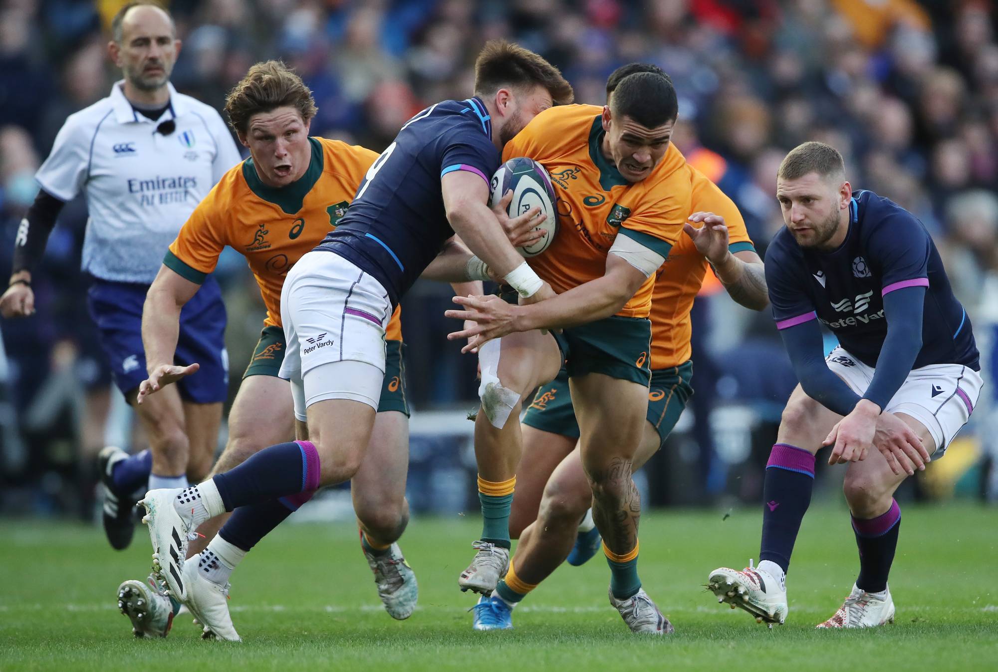  Izaia Perese of Australia is tackled by Ali Price and Finn Russell of Scotland during the Autumn Nations Series match between Scotland and Australia at Murrayfield Stadium on November 07, 2021 in Edinburgh, Scotland. (Photo by Ian MacNicol/Getty Images)
