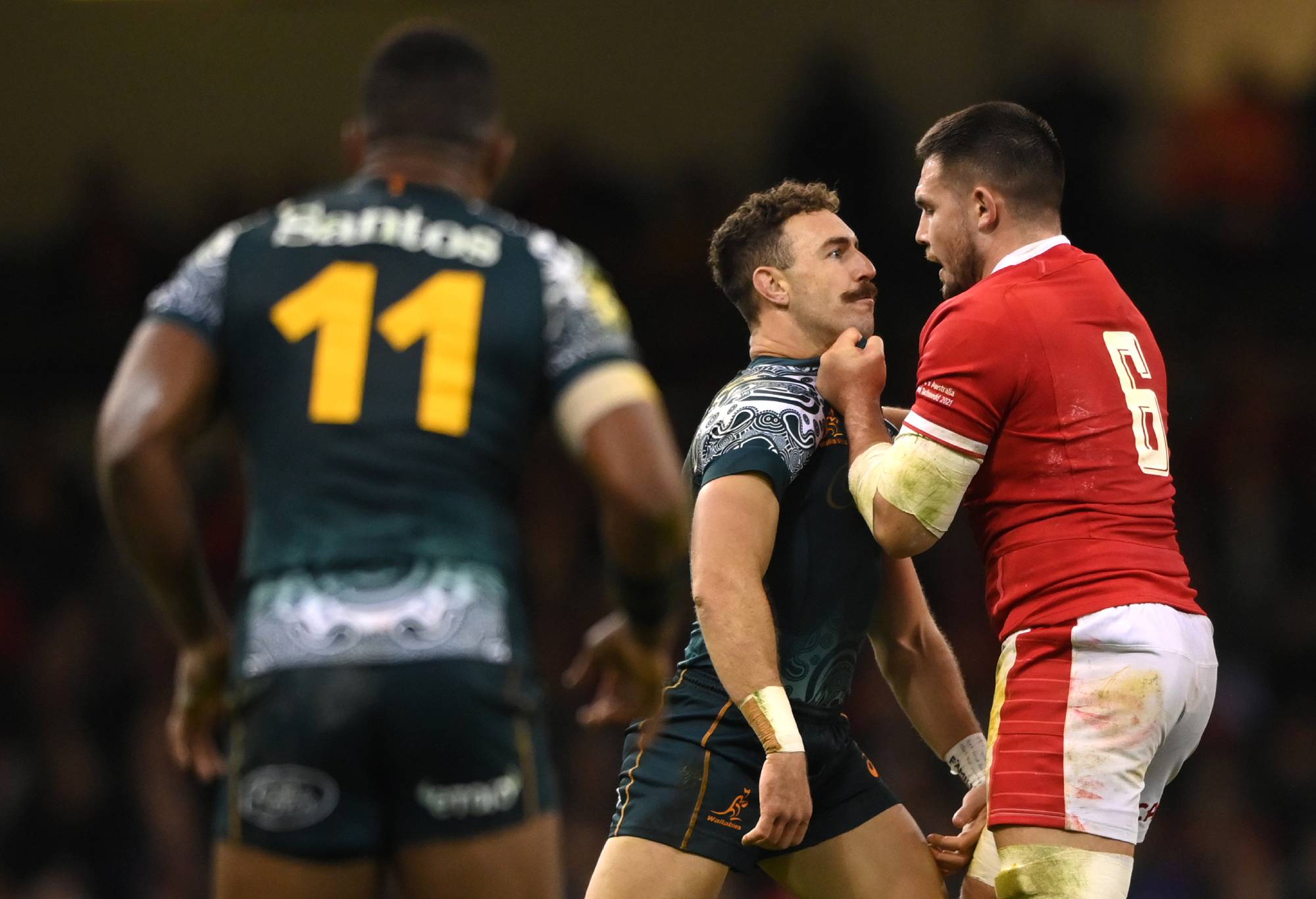 Wales flanker Ellis Jenkins gets to grips with Wallabies scrum half Nic White during the Autumn Nations Series match between Wales and Australia at Principality Stadium on November 20, 2021 in Cardiff, Wales. (Photo by Stu Forster/Getty Images)