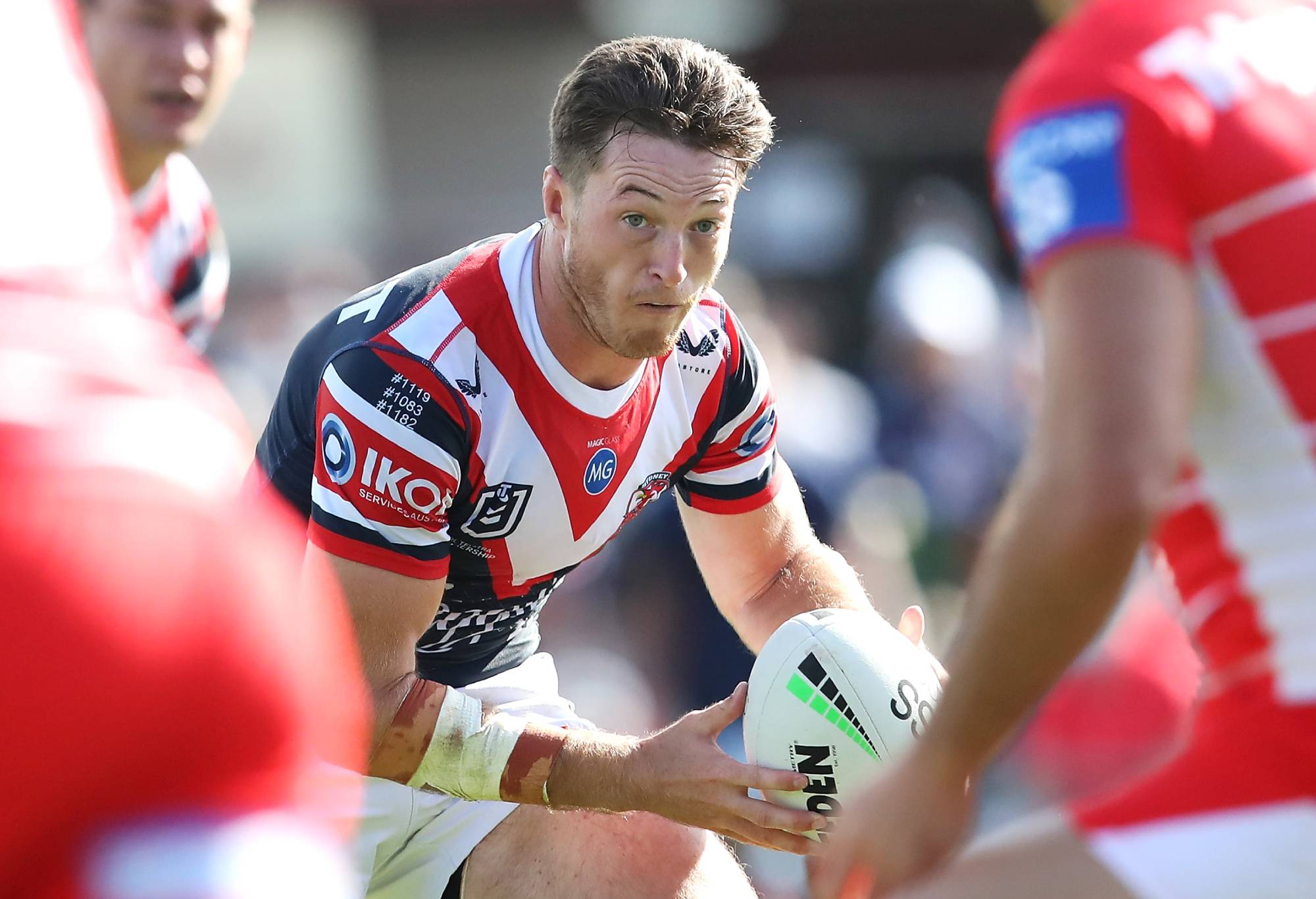 Sam Verrills of the Roosters heads the ball during the NRL Round 23 match between St George Illawarra Dragons and Sydney Roosters at Clive Berghofer Stadium on August 22, 2021, in Toowoomba, Australia.  (Photo by Jono Searle/Getty Images)