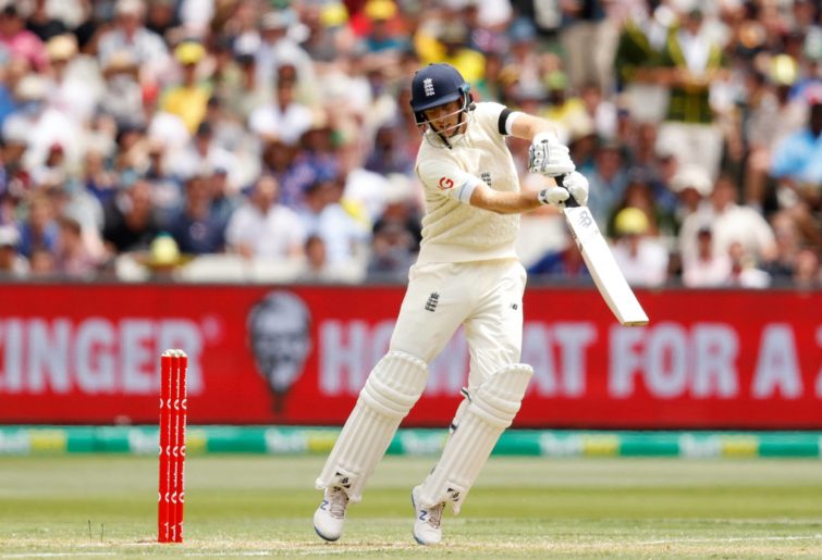 Joe Root of England edges a ball to Alex Carey off the bowling of Mitchell Starc of Australia during day one of the Third Test match in the Ashes series between Australia and England at Melbourne Cricket Ground on December 26, 2021 in Melbourne, Australia. (Photo by Darrian Traynor - CA/Cricket Australia via Getty Images)