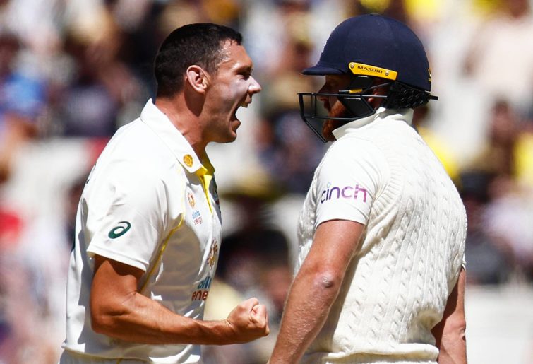 Scott Boland of Australia (L) celebrates after dismissing Jonathan Bairstow of England (R) during day three of the Third Test match in the Ashes series between Australia and England at Melbourne Cricket Ground on December 28, 2021 in Melbourne, Australia. (Photo by Daniel Pockett - CA/Cricket Australia via Getty Images)