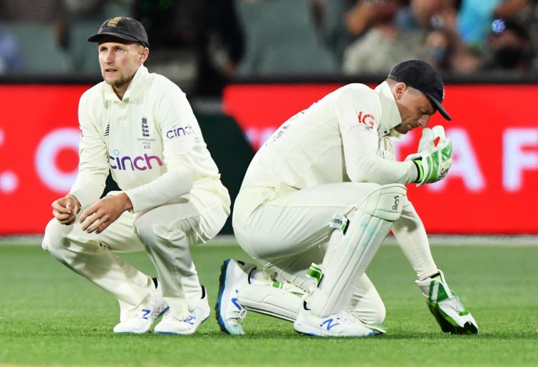 Joe Root captain of England Jos Buttler of England react after dropping Marnus Labuschagne of Australia on 95 and during day one of the Second Test match in the Ashes series between Australia and England at Adelaide Oval on December 16, 2021 in Adelaide, Australia. (Photo by Mark Brake - CA/Cricket Australia via Getty Images)