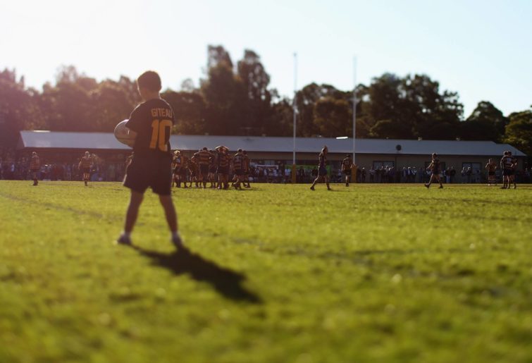 The ball boy wearing a Giteau number 10 shirt watches on during the round 17 third division NSW Suburban Rugby Union match between Balmain and Epping at Blackmore Park on August 14, 2010 in Sydney, Australia. (Photo by Mark Kolbe/Getty Images)
