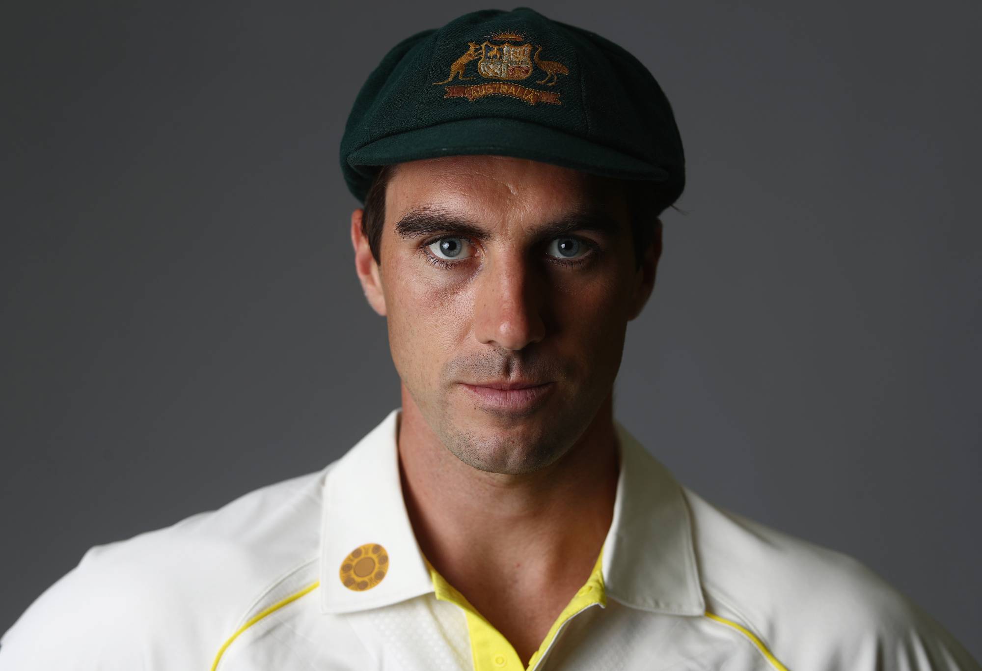 Patrick Cummins poses during the Australia Test Cricket Team headshots session at NCC on November 30, 2021 in Brisbane, Australia. (Photo by Chris Hyde/Getty Images)