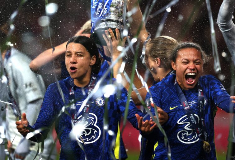 Sam Kerr of Chelsea celebrates with team mates as Chelsea celebrate victory during the Vitality Women's FA Cup Final between Arsenal FC and Chelsea FC at Wembley Stadium on December 05, 2021 in London, England. (Photo by Alex Pantling/Getty Images)