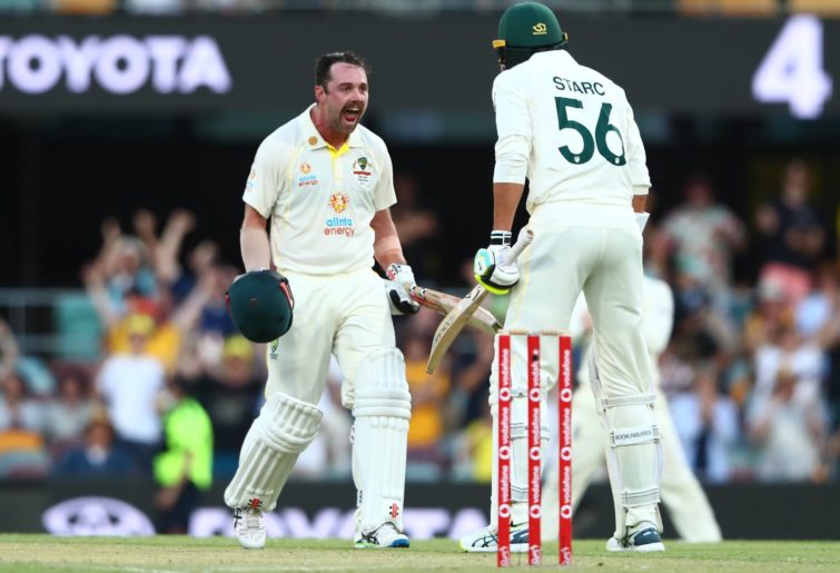 Travis Head of Australia celebrates a century during day two of the First Test Match in the Ashes series between Australia and England at The Gabba on December 09, 2021 in Brisbane, Australia. (Photo by Chris Hyde/Getty Images) (Photo by Chris Hyde/Getty Images)