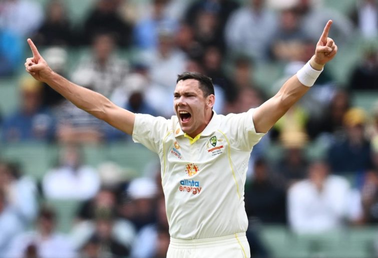 Scott Boland of Australia celebrates after taking his first test wicket dismissing Mark Wood of England during day one of the Third Test match in the Ashes series between Australia and England at Melbourne Cricket Ground on December 26, 2021 in Melbourne, Australia. (Photo by Quinn Rooney/Getty Images)