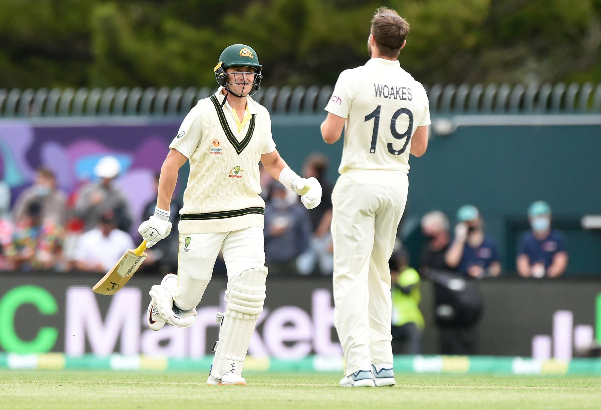 Marnus Labuschagne of Australia smiles at Chris Woakes of England during day one of the Fifth Test in the Ashes series between Australia and England at Blundstone Arena on January 14, 2022 in Hobart, Australia. (Photo by Matt Roberts - CA/Cricket Australia via Getty Images)