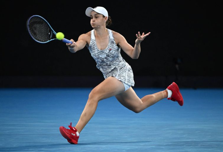 MELBOURNE, AUSTRALIA - JANUARY 29: Ashleigh Barty of Australia plays a forehand in her Women's Singles Final match against Danielle Collins of United States during day 13 of the 2022 Australian Open at Melbourne Park on January 29, 2022 in Melbourne, Australia. (Photo by Quinn Rooney/Getty Images)
