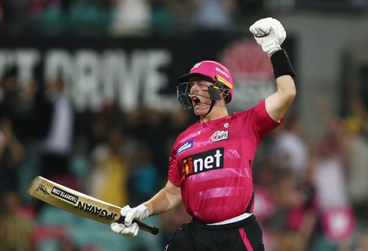 Hayden Kerr of the Sixers celebrates hitting the winning runs with Jay Lenton of the Sixers during the Men's Big Bash League match between the Sydney Sixers and the Adelaide Strikers at Sydney Cricket Ground, on January 26, 2022, in Sydney, Australia. (Photo by Jason McCawley - CA/Cricket Australia via Getty Images)