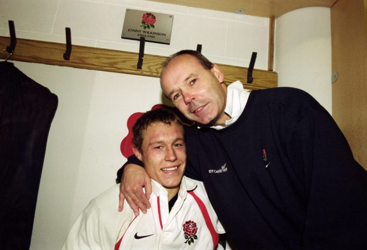 England Manager Clive Woodward puts a congratulatory arm round Jonny Wilkinson after the 2001 Cook Cup match between England and Australia played at Twickenham Rugby Ground in London. England beat Australia 21 - 15. \ Mandatory Credit: DaveRogers /Allsport
