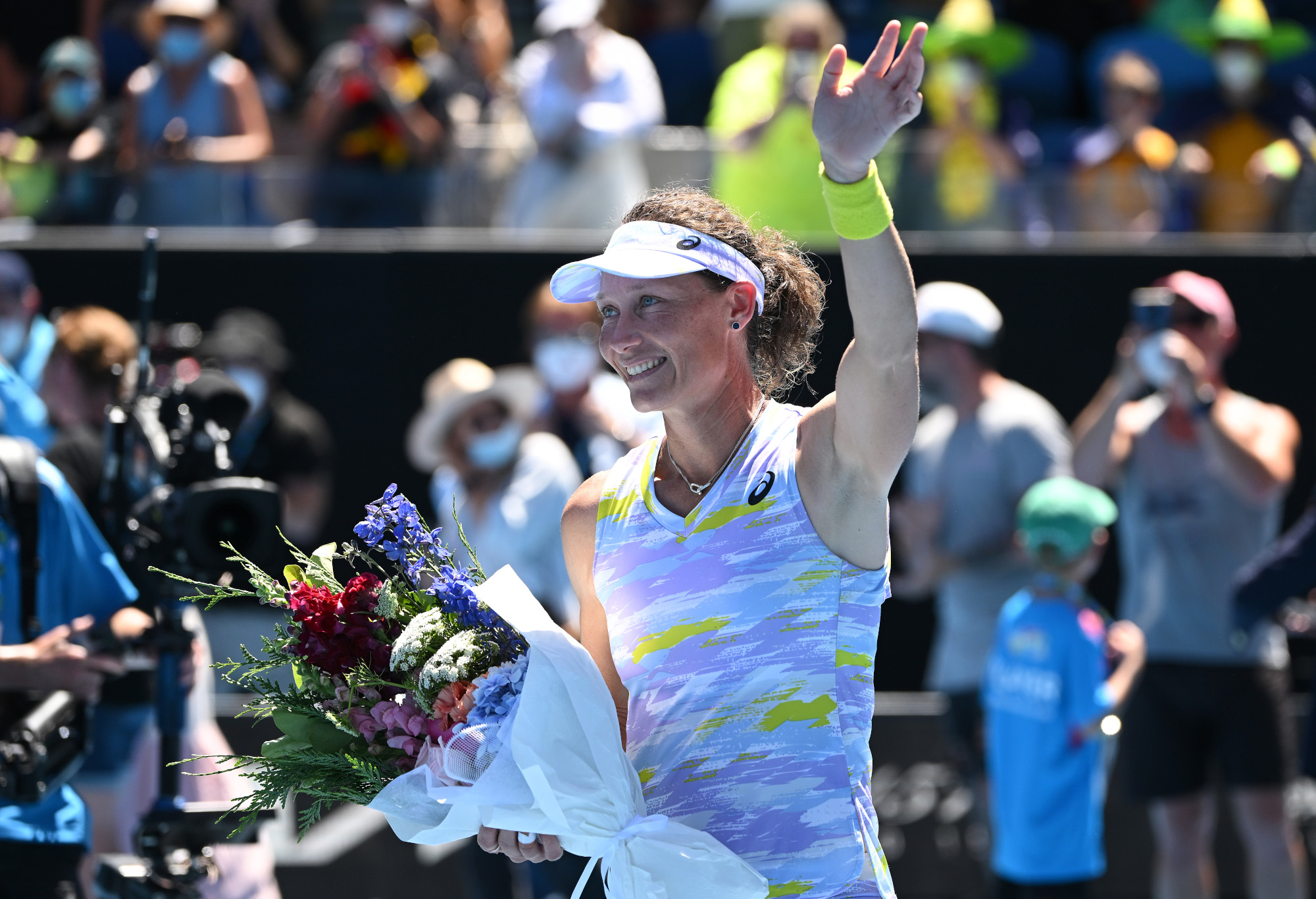 Sam Stosur acknowledges the crowd after playing her last career singles match.