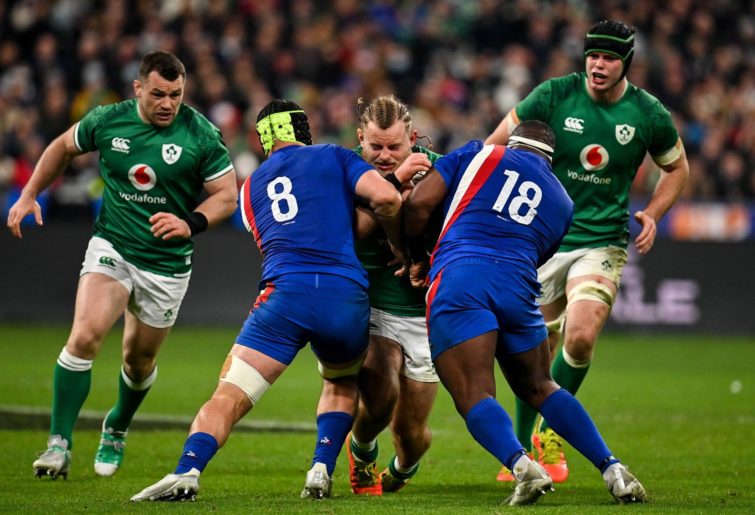 Finlay Bealham of Ireland is tackled by Gregory Alldritt, left, and Demba Bamba of France during the Guinness Six Nations Rugby Championship match between France and Ireland at Stade de France in Paris, France. (Photo By Seb Daly/Sportsfile via Getty Images)