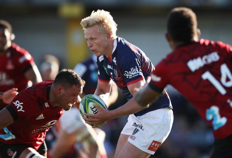 Carter Gordon of the Rebels takes on the defence during the round five Super Rugby Trans-Tasman match between the Melbourne Rebels and the Crusaders at Leichhardt Oval on June 12, 2021 in Sydney, Australia. (Photo by Matt King/Getty Images)