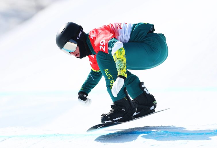 Jarryd Hughes of Team Australia competes during the Men's Snowboard Cross Qualification on Day 6 of the Beijing 2022 Winter Olympics at Genting Snow Park on February 10, 2022 in Zhangjiakou, China. (Photo by Clive Rose/Getty Images)