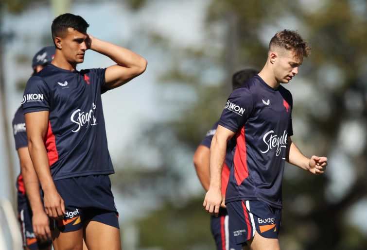 SYDNEY, AUSTRALIA - MARCH 29: Joseph Suaalii and Sam Walker warm up during a Sydney Roosters NRL training session at Kippax Lake on March 29, 2021 in Sydney, Australia. (Photo by Matt King/Getty Images)