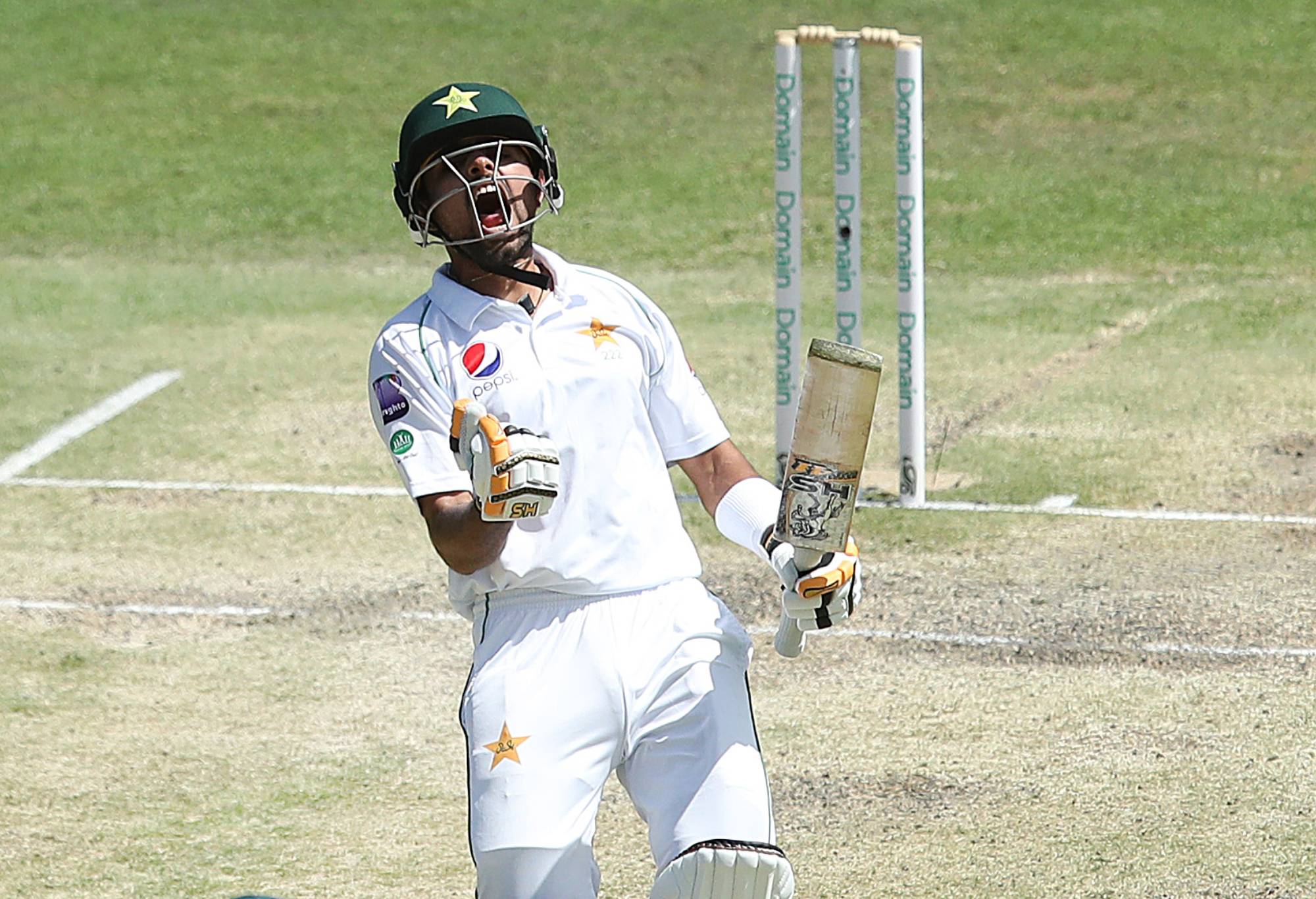 Babar Azam of Pakistan celebrates a century during day four of the 1st Domain Test between Australia and Pakistan at The Gabba on November 24, 2019 in Brisbane, Australia. (Photo by Jono Searle - CA/Cricket Australia via Getty Images)