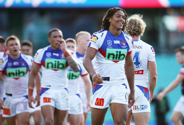 SYDNEY, AUSTRALIA - MARCH 12: Dominic Young of the Knights celebrates victory with team mates after the round one NRL match between the Sydney Roosters and the Newcastle Knights at Sydney Cricket Ground, on March 12, 2022, in Sydney, Australia. (Photo by Matt King/Getty Images)