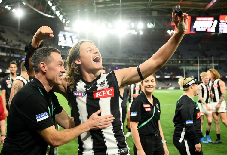 Magpies head coach Craig McRae and Jack Ginnivan of the Magpies celebrates winning the round one AFL match between the St Kilda Saints and the Collingwood Magpies at Marvel Stadium on March 18, 2022 in Melbourne, Australia. (Photo by Quinn Rooney / Getty Images)