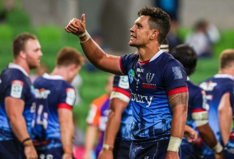 Matt To'omua of the Rebels makes a gesture towards the crowd.