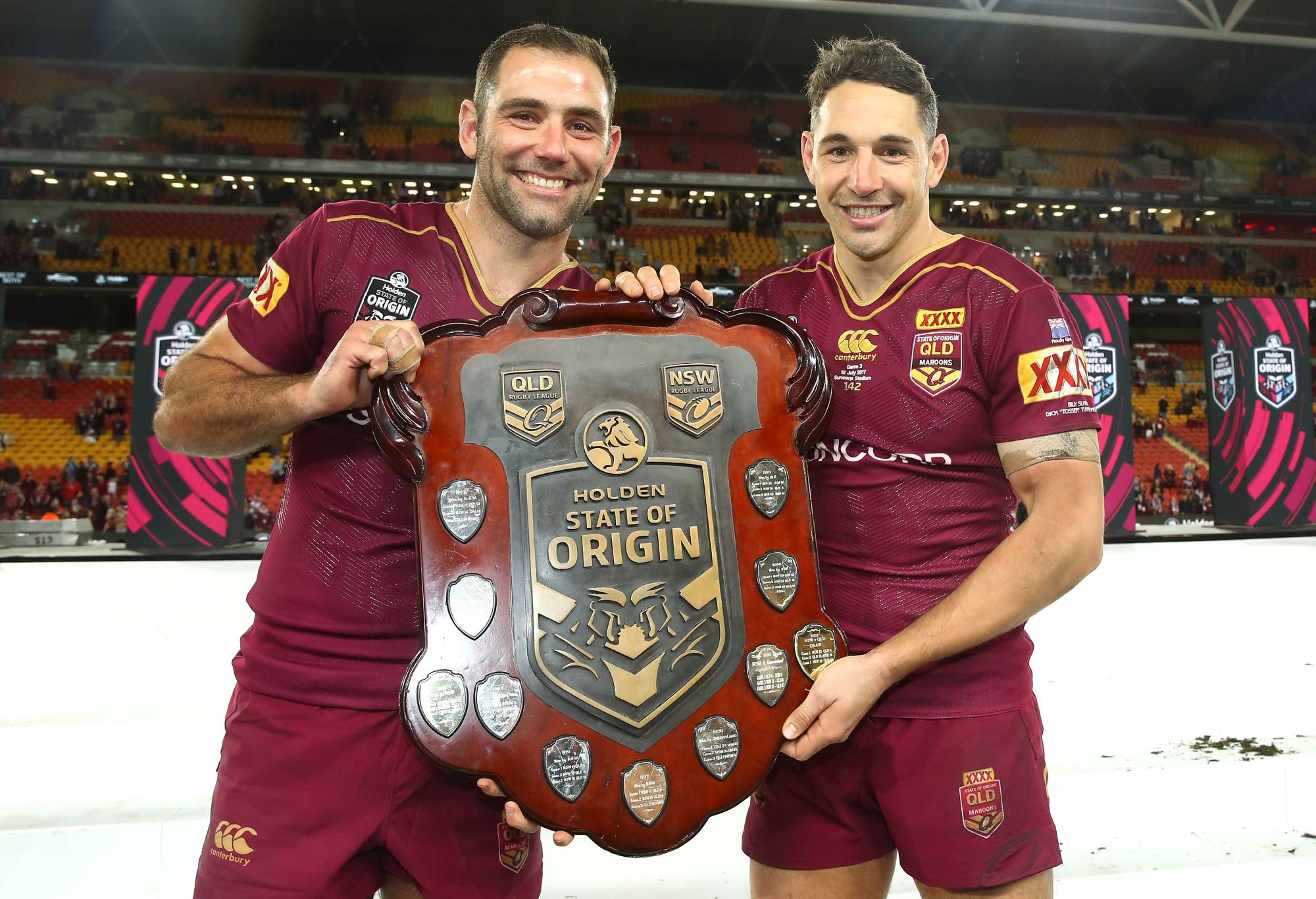 BRISBANE, AUSTRALIA - JULY 12: Cameron Smith and Billy Slater of the Maroons pose with the shield as they celebrate victory during game three of the State Of Origin series between the Queensland Maroons and the New South Wales Blues at Suncorp Stadium on July 12, 2017 in Brisbane, Australia. (Photo by Mark Kolbe/Getty Images)