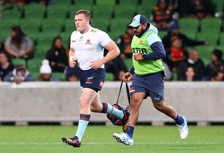 Angus Bell of the Waratahs leaves the field after receiving a red card during the round 10 Super Rugby Pacific match between the Chiefs and the NSW Waratahs at AAMI Park on April 22, 2022 in Melbourne, Australia. (Photo by Kelly Defina/Getty Images)