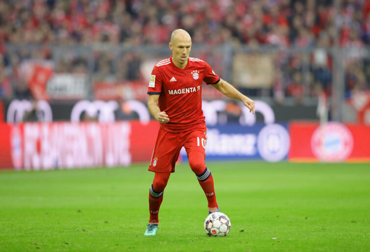 Arjen Robben of Bayern Munich dribbles
