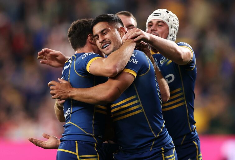 SYDNEY, AUSTRALIA - APRIL 03: Dylan Brown of the Eels celebrates with his team mates after scoring a try during the round four NRL match between the Parramatta Eels and the St George Illawarra Dragons at CommBank Stadium, on April 03, 2022, in Sydney, Australia. (Photo by Mark Kolbe/Getty Images)