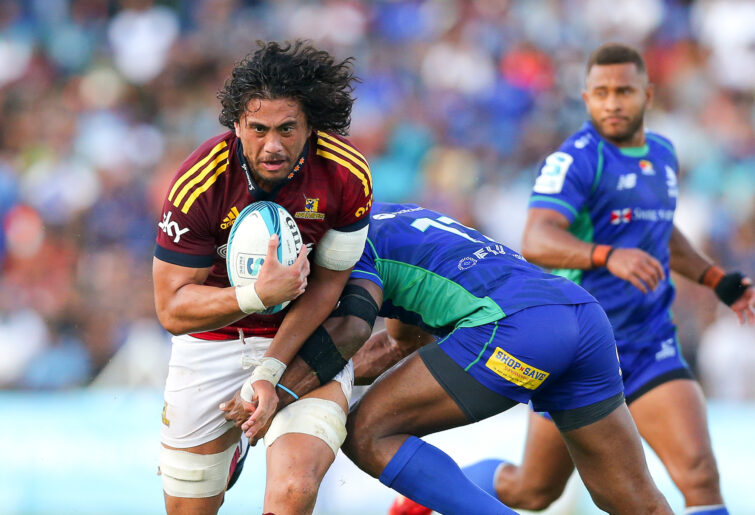 Marino Mikaele-Tu'u of the Highlanders is tackled by Vinaya Habosi of Fijian Drua.