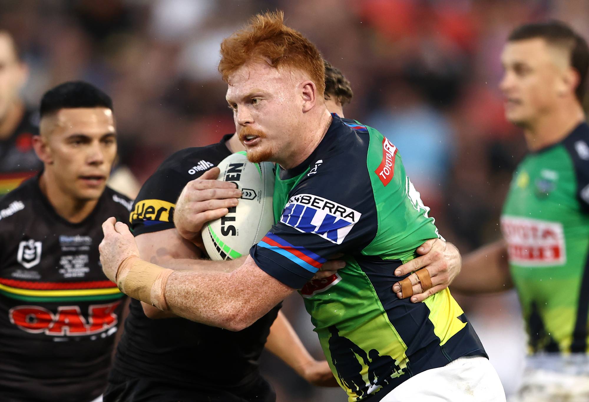 PENRITH, AUSTRALIA - APRIL 24: Corey Horsburgh of the Raiders is tackled during the round seven NRL match between the Penrith Panthers and the Canberra Raiders at BlueBet Stadium on April 24, 2022, in Penrith, Australia. (Photo by Matt Blyth/Getty Images)