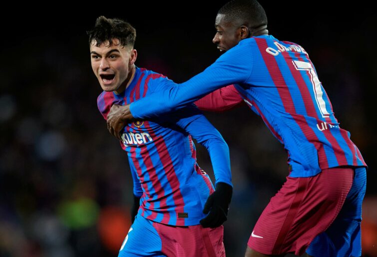 Pedro Gonzalez Lopez "Pedri" of FC Barcelona celebrates with Ousmane Dembele after scoring his team's first goal during the LaLiga Santander match between FC Barcelona and Sevilla FC at Camp Nou on April 03, 2022 in Barcelona, Spain. (Photo by Pedro Salado/Quality Sport Images/Getty Images)