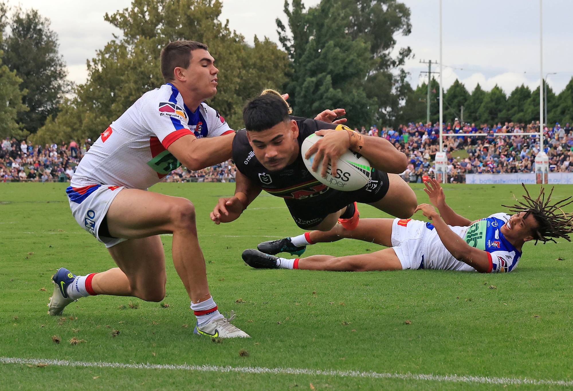 BATHURST, AUSTRALIA - MARCH 26: Taylor May of the Panthers scores a try during the round three NRL match between the Penrith Panthers and the Newcastle Knights at Carrington Park, on March 26, 2022, in Bathurst, Australia. (Photo by Mark Evans/Getty Images)