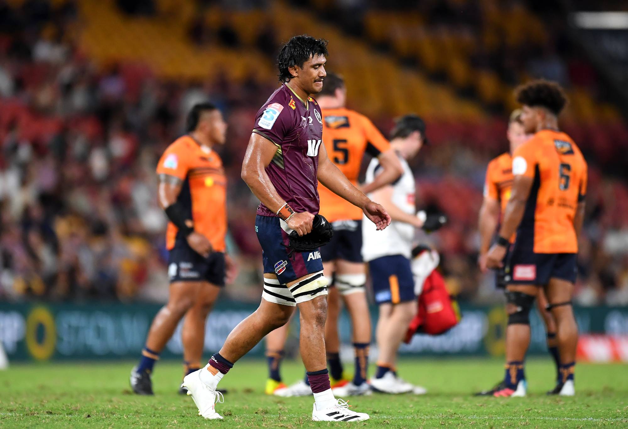 Tuaina Taii Tualima of the Reds leaves the field after being shown a red card during the round seven Super Rugby Pacific match between the Queensland Reds and the ACT Brumbies at Suncorp Stadium on April 02, 2022 in Brisbane, Australia. (Photo by Albert Perez/Getty Images)