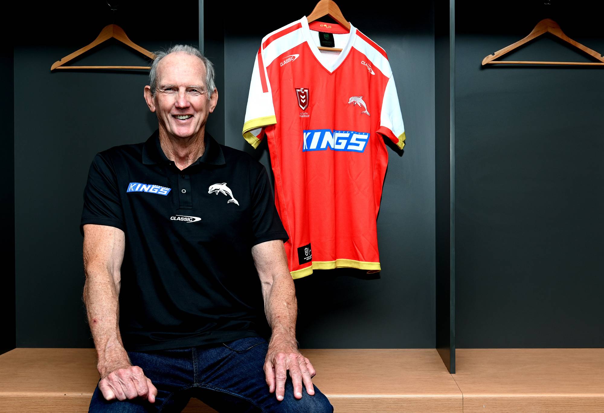 BRISBANE, AUSTRALIA - OCTOBER 27: Wayne Bennett poses for a photo with the revealing of the Dolphins Heritage Round jersey during a Dolphins NRL press conference at Suncorp Stadium on October 27, 2021 in Brisbane, Australia. (Photo by Bradley Kanaris/Getty Images)