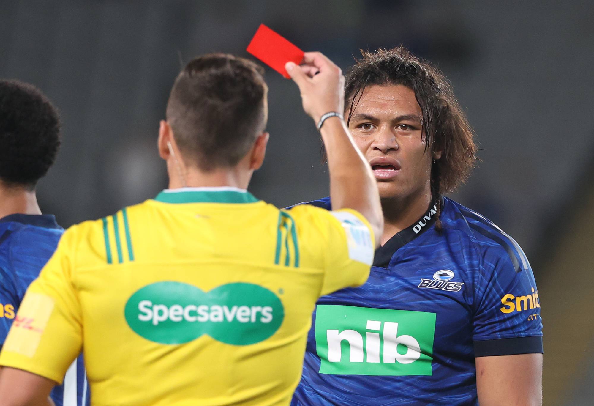 Caleb Clarke of the Blues (R) is sent off with a red card by referee James Doleman during the round seven Super Rugby Pacific match between the Blues and the Moana Pasifika at Eden Park on April 02, 2022 in Auckland, New Zealand. (Photo by Fiona Goodall/Getty Images)